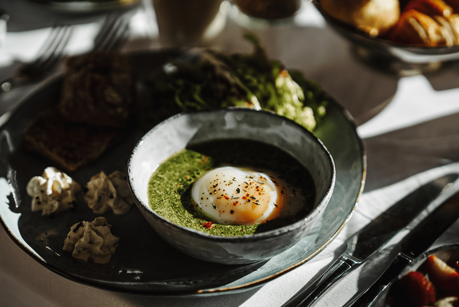 Breakfast at Les Mazots du Clos: a softly poached egg with herbs